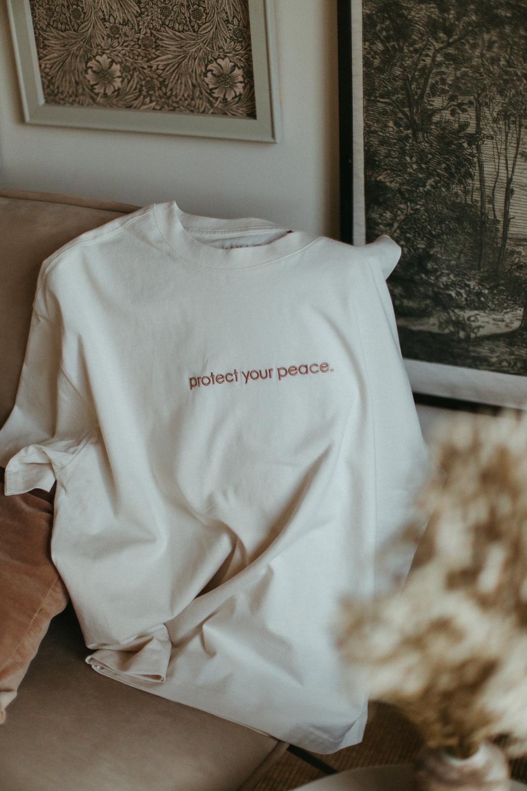 T-shirt/protect your peace.