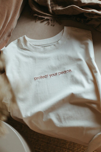 T-shirt/protect your peace.